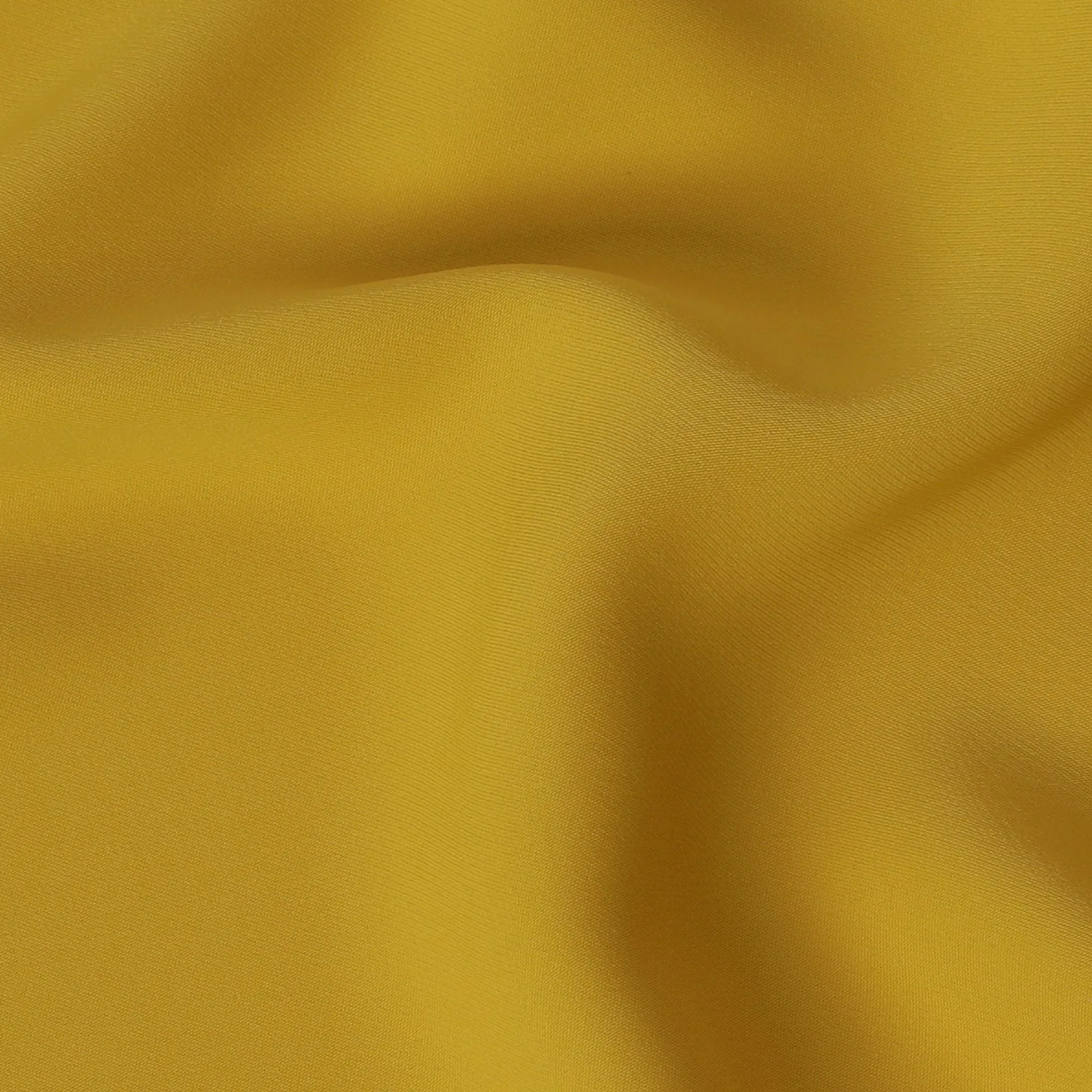 Mustard yellow plain synthetic stretchable barbie crepe fabric-D17019